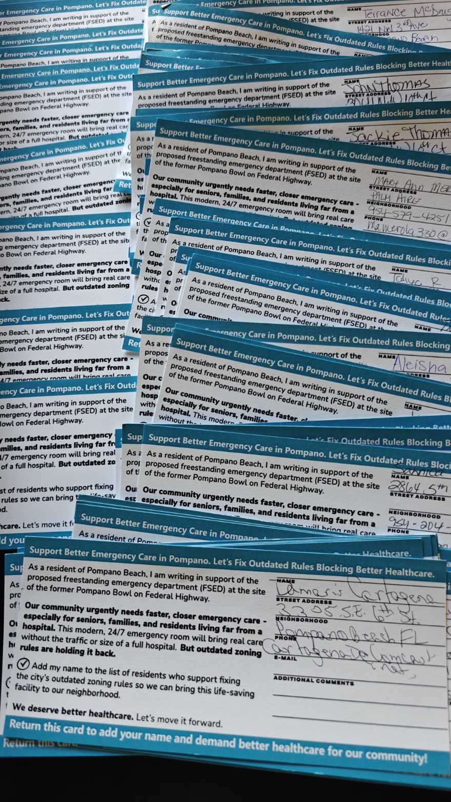 Stack of signed petitions from Pompano Beach residents